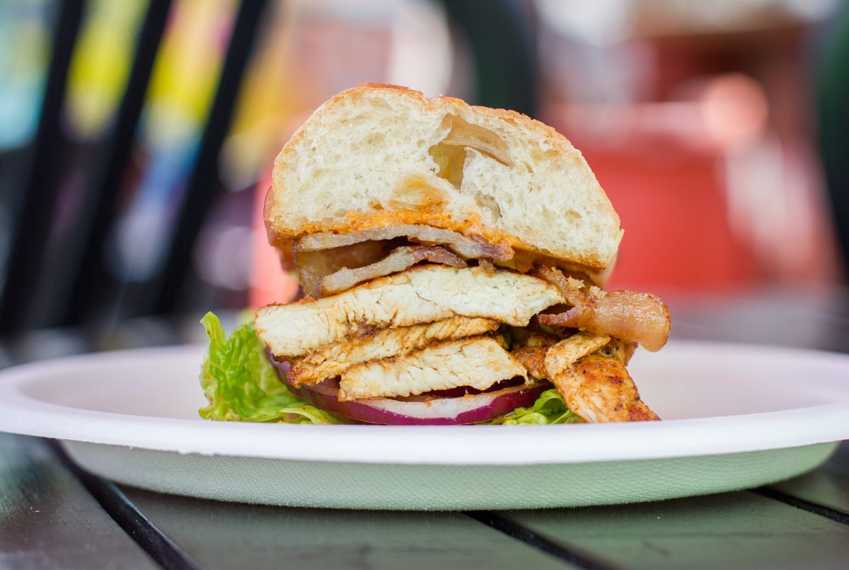 Chicken club sandwich with bacon, lettuce and tomato