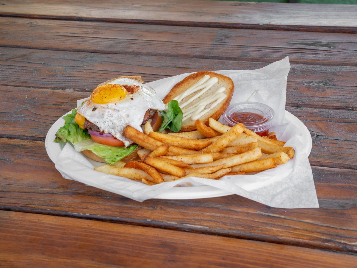 Chef's special burger topped with a fried egg