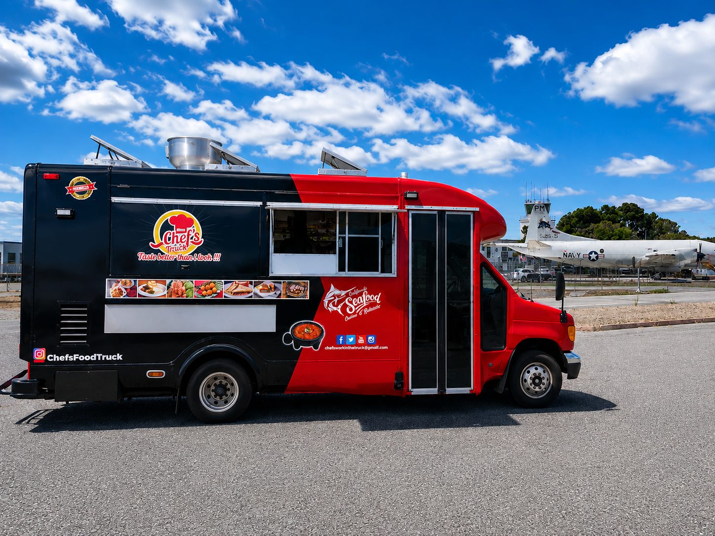 The Chef's Truck — a red and black food truck parked under a blue sky